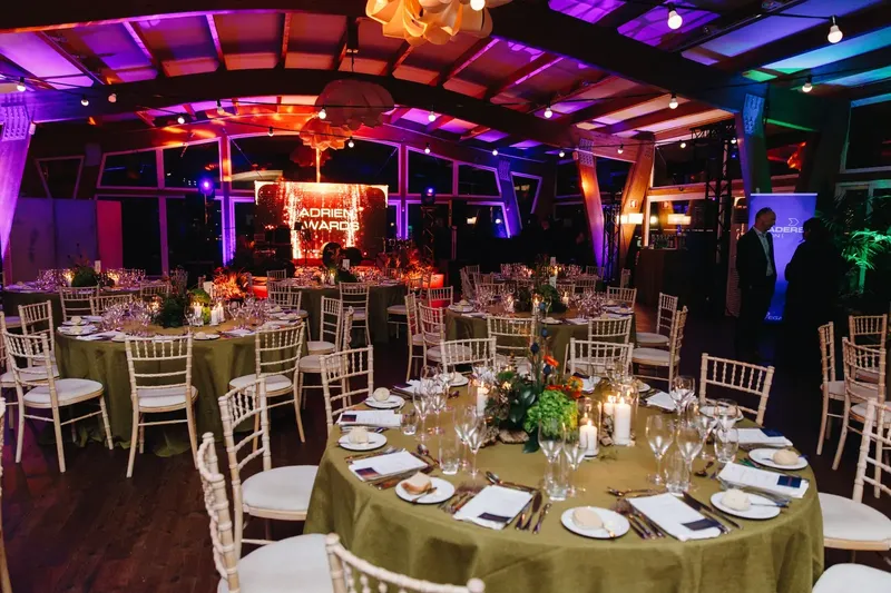 Corporate gala dinner produced by BTQ Events at LEADERS LISBON, long tables under chandeliers