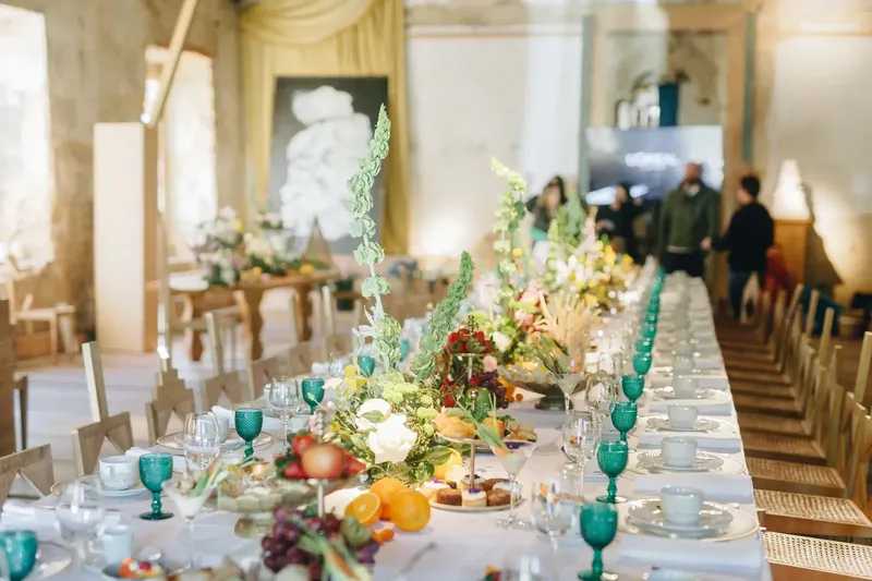 Award ceremony gala produced by BTQ Events for L'Oréal, banquet tables with botanical florals and candlelight