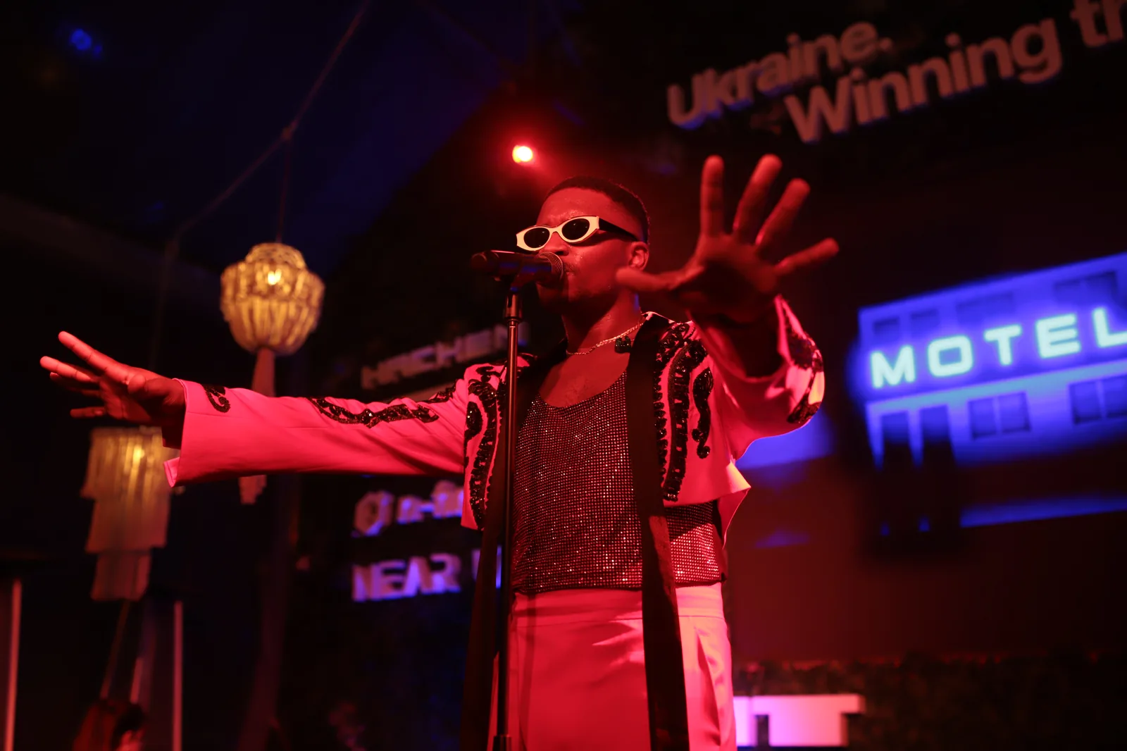 Live performer on stage at a BTQ event production