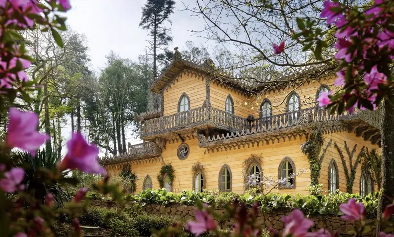 Chalet of the Countess of Edla framed by azaleas