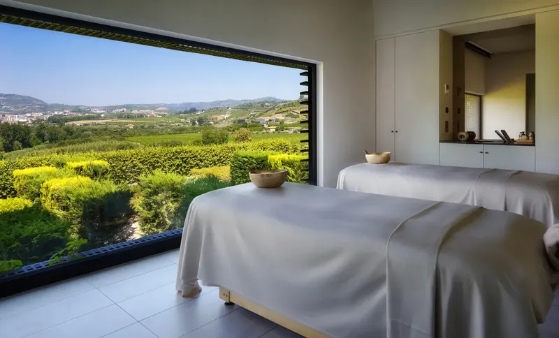 Six Senses Douro Valley spa treatment room — full-cohort wellness rotation